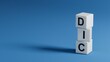 © bo - The word dic is written on wooden elements. Medical concept.close up of wooden elements,Business Concept.3D rendering on blue background.