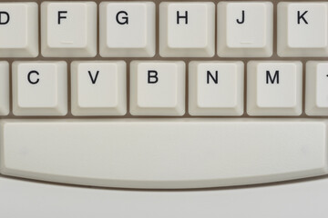 Close-up of white computer keyboard background