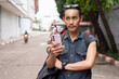 © Ranta Images - Nonbinary genderfluid young Thai gay man tourist in Thailand