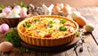 © yoga - Easter quiche with eggs and Easter decorations.