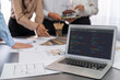 © InfiniteFlow - Group of interior architect designer discussing together on blueprint and laptop screen display architecture software for more precise designing layout. Modern home design and renovation. Insight