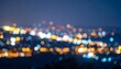 © Ultimate - Blurred night city lights with blue and yellow bokeh motion.