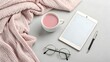 © Samoresh - Flatlay of modern tech accessories on neutral matte surface