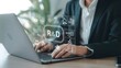 © Md Fazly Rabby - R and D, Research and Development Innovation Technology Concept. A person working on laptop with icons and text R and D, symbolizing innovation, analysis, and scientific business development processes