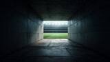 View of a football stadium tunnel leading to the field. Captures anticipation, atmosphere, and the dramatic path players take before entering the match.