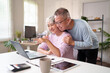 © snowing12 - Senior Asian Couple Using Laptop at Home Together Smiling Asian Older People Enjoying Online Time Relaxing at Home Asian Older Relationship Happiness