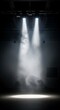 © arastudio - Twin Beams of Light Cutting Through Stage Fog in a Darkened Theater