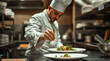 © AbdullahAl - Chef Preparing Gourmet Food in Professional Kitchen