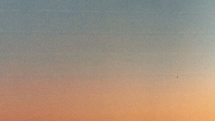 Wall Mural - soft textured gradient sky in warm peach and cool blue tones ideal for minimalist background, print design, calming web banner, or subtle branding texture

