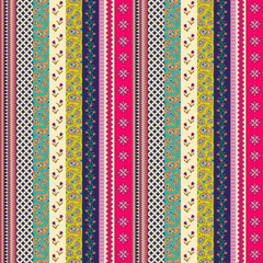 Wall Mural - Beautiful seamless patchwork pattern of vertical ornamental bright stripes. Print on fabric in ethnic style.
