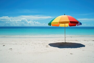 Wall Mural - Vibrant rainbow umbrella provides shade on sunny beach with clear blue sky and gentle waves, Vibrant umbrella on sunny sandy beach Clear sky and serene atmosphere