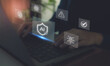 © Parradee - AI Cybersecurity Protection Concept. Hands typing on a laptop with digital icons; artificial intelligence, cybersecurity, data protection and warning signals, secure AI technology and online safety.