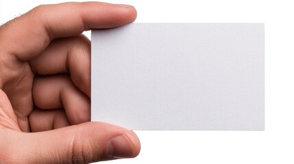 Wall Mural - A hand holding a blank white business card against a plain white background.