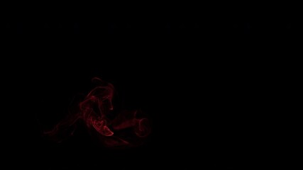 Wall Mural - golden glowing smoke wisps on black background