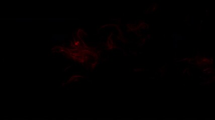 Wall Mural - golden glowing smoke burst on black background