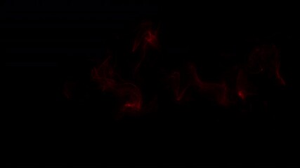 Wall Mural - golden glowing smoke burst on black background