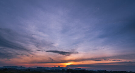 Wall Mural - dusk sky, evening sky on twilight dark blue hour after sun down, horizon landscape over silhouette m
