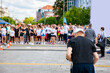 © Roman_23203 - Photographer is taking photo of large group of athletes waiting at marathon start line