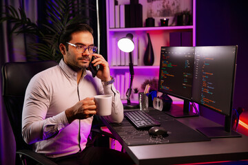 smart it developer calling to coworker with holding coffee cup solving error software development co