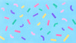 © zamuruev - Vibrant confetti pieces in various shapes and colors scattered across a light blue backdrop. Bright and cheerful setting, ideal for festive events, party supplies, greeting cards