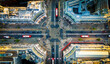 Aerial view of Oxford Circus in London with busy streets, iconic architecture, and red double-decker buses on a clear, sunny day