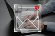 © New Africa - Email marketing, new message notification. Man using laptop at table, closeup
