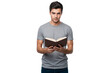 © The Stock Guy - Young man in casual clothes holding and reading an open book while looking forward, isolated on transparent background
