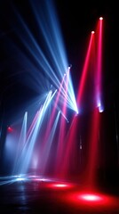 Wall Mural - red and blue stage lights illuminating dark room with haze