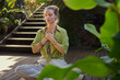 © Rido - Young beautiful woman meditating in retreat