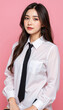© Hathairat - Young woman with long dark hair wearing white shirt and black tie posing confidently against pink background