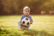 © standret - Little boy is having fun on the field outdoors