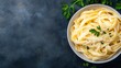 © Larisa AI - A close-up view of a bowl of silky fettuccine pasta topped with freshly grated Parmesan cheese and garnished with parsley, showcasing both culinary skill and delectable flavors.
