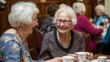 © Nu - Elderly residents and volunteers chatting and enjoying tea during a community outreach event