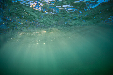 Wall Mural - beautiful blue ocean with warm sunlight.