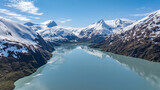 aerial landscape view of Portage Lake with surrounding mountain landscape at Portage Glacier in Alaska with snow covered mountains around the glacier lake