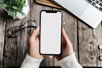 High Quality Image of Hands Using Smartphone Mockup on Worktable