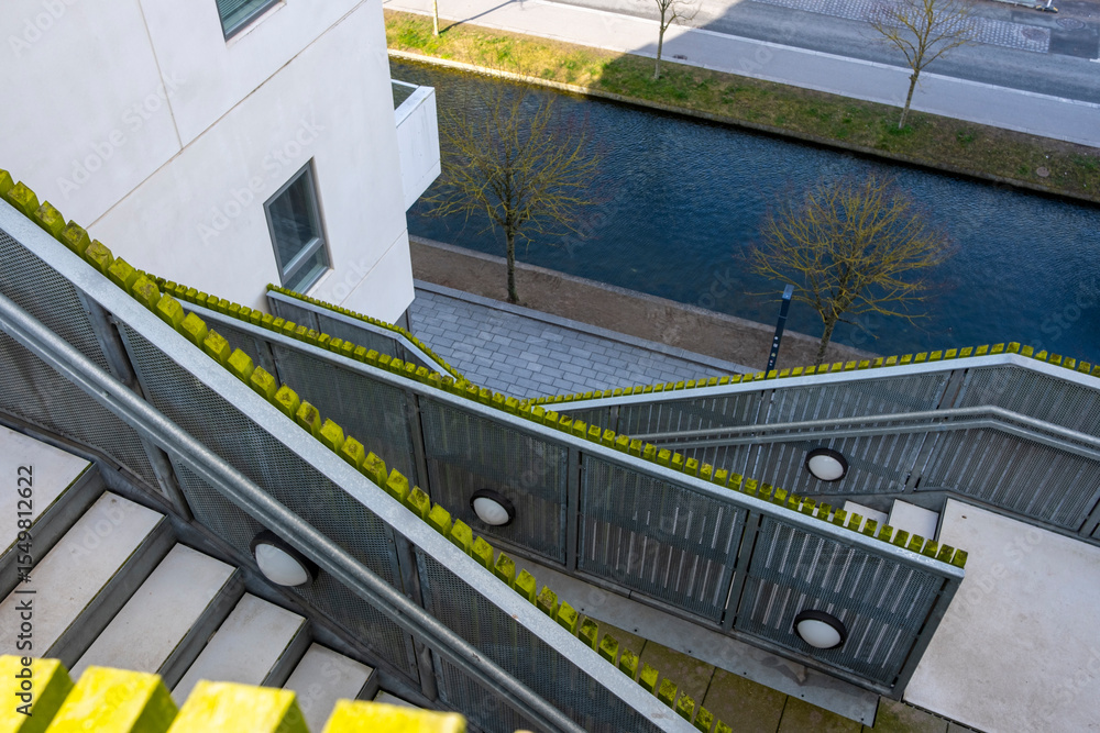 Overhead Railing View Stock-Foto „Overhead view of stairs and yellow railing in a layered ...