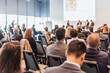 © kasto - Interview and round table discussion at business convention and presentation. Audience at the conference hall. Business and entrepreneurship symposium.