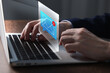 © New Africa - Email marketing, new message notification. Man using laptop at table, closeup