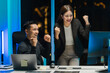 © Kritdanai - Successful Business Team Celebrating at Night