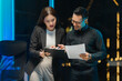 © Kritdanai - Business Colleagues Reviewing Documents Together