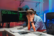 © Kritdanai - Overworked Woman at Computer with Coding