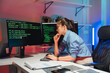 © Kritdanai - Focused Programmer Working at Desk
