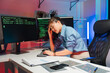 © Kritdanai - Stressed Asian Programmer Working Late
