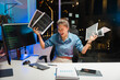 © Kritdanai - Frustrated Woman with Coding Documents at Desk