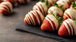 © svastix - A close-up view of strawberries elegantly dipped in white chocolate, drizzled with chocolate, creating a delightful treat that tantalizes the senses with sweetness.