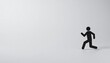 © Shousei - 淡いライトグレーのマット背景の片隅に、クリーンなラインアートで表現された走る人物のピクトグラムが配置され、広いコピー空間を活かした洗練された構図