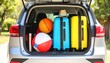 © Марина Каліш - Car trunk filled with travel accessories: suitcases, beach ball, travel thermos. Bright colors.