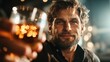 © svastix - This warm portrait of a man toasting his drink captures the essence of friendship and celebration, highlighting the joy of sharing moments with loved ones during evenings.