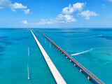 Boat traveling under the Seven Mile Bridge at Marathon in the Florida Keys, Monroe County, Florida, United States